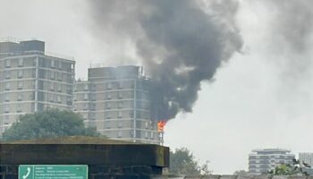 Plaistow fire: Flames and smoke billow from tower block as 70 firefighters battle blaze