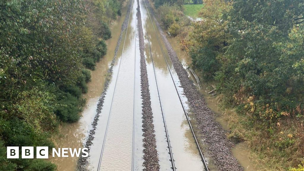 Roads flooded, trains cancelled and schools close