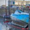 Sunken fishing boat leaves 'stinking' oil leaking into beauty spot harbour