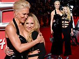 Ted Lasso stars Hannah Waddingham and Juno Temple wow in racy black gowns as they join leading man Tom Hardy at the Venom: The Last Dance UK premiere