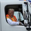 Trump trolls Harris and Biden by riding a GARBAGE TRUCK to his Wisconsin rally