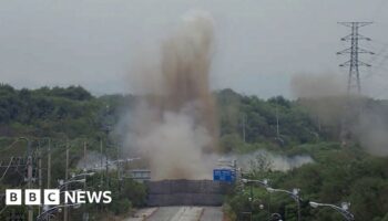 Watch as North Korea blows up roads connecting to South Korea