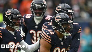 Daniel Hardy celebrates with his Chicago Bears team-mates