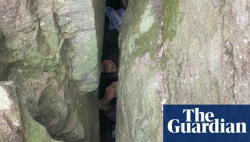 Woman wedged upside down between boulders for seven hours after trying to retrieve phone in regional NSW