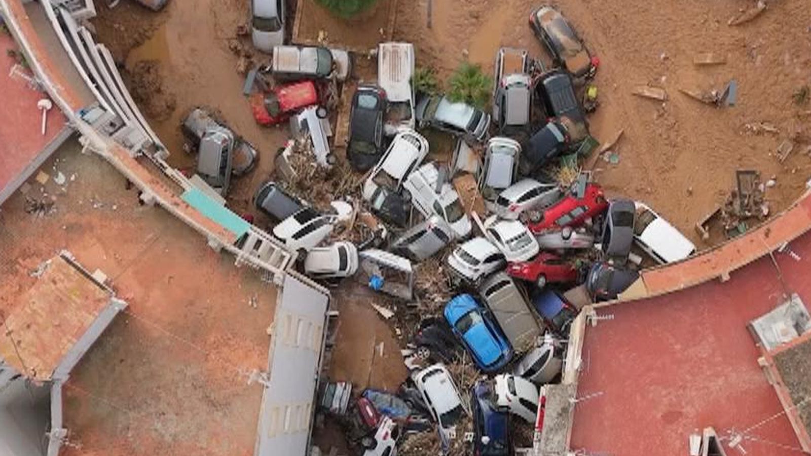 Wrecked cars in Alfafar, Spain, after the floods