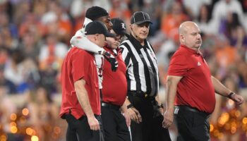 Louisville football player stretchered off, hospitalized after suffering injury in game