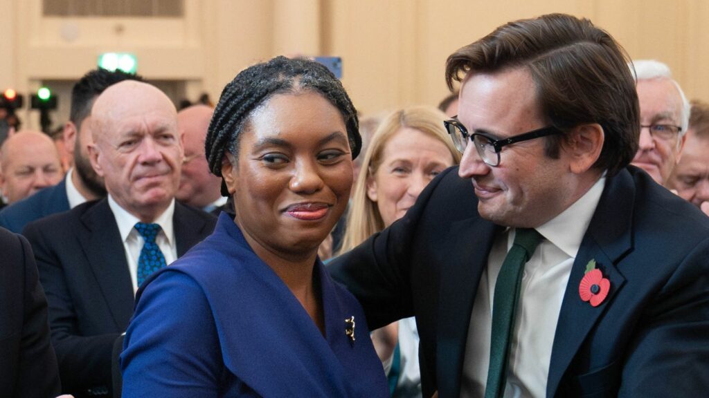 Kemi Badenoch is congratulated by her husband, Hamish. Pic: PA