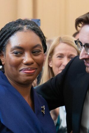 Kemi Badenoch is congratulated by her husband, Hamish. Pic: PA