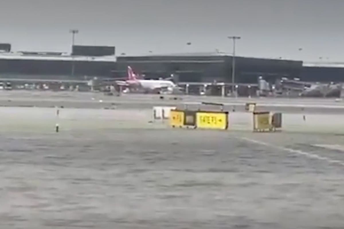 Spain floods latest: Barcelona Airport flooded as frantic search for survivors turns to underground car parks