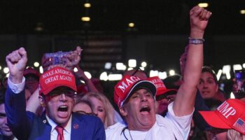 Supporters arrive at an election night watch party for Republican presidential nominee former President Donald Trump Tuesday, Nov. 5, 2024, in West Palm Beach, Fla. (AP Photo/Evan Vucci)