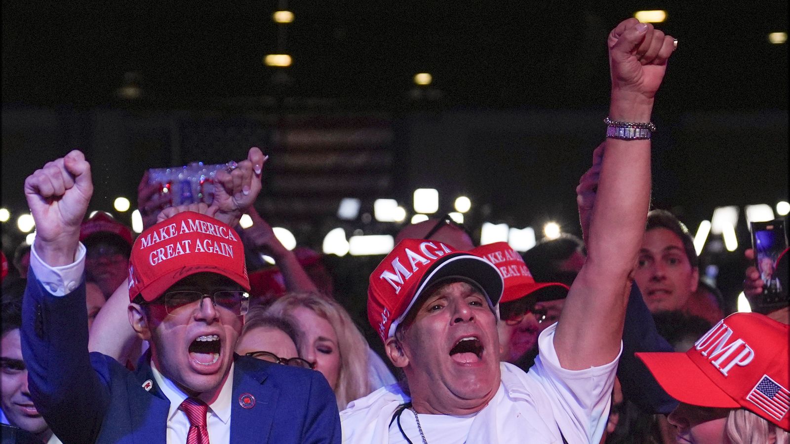 Supporters arrive at an election night watch party for Republican presidential nominee former President Donald Trump Tuesday, Nov. 5, 2024, in West Palm Beach, Fla. (AP Photo/Evan Vucci)