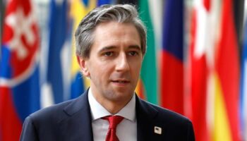 Simon Harris arrives for an EU summit in Brussels. Pic: AP