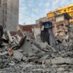 A man stands on the rubble of damaged buildings, in the aftermath of Israeli strikes on Beirut's southern suburbs, amid the ongoing hostilities between Hezbollah and Israeli forces, Lebanon, November 7, 2024. REUTERS/Mohammed Yassin TPX IMAGES OF THE DAY