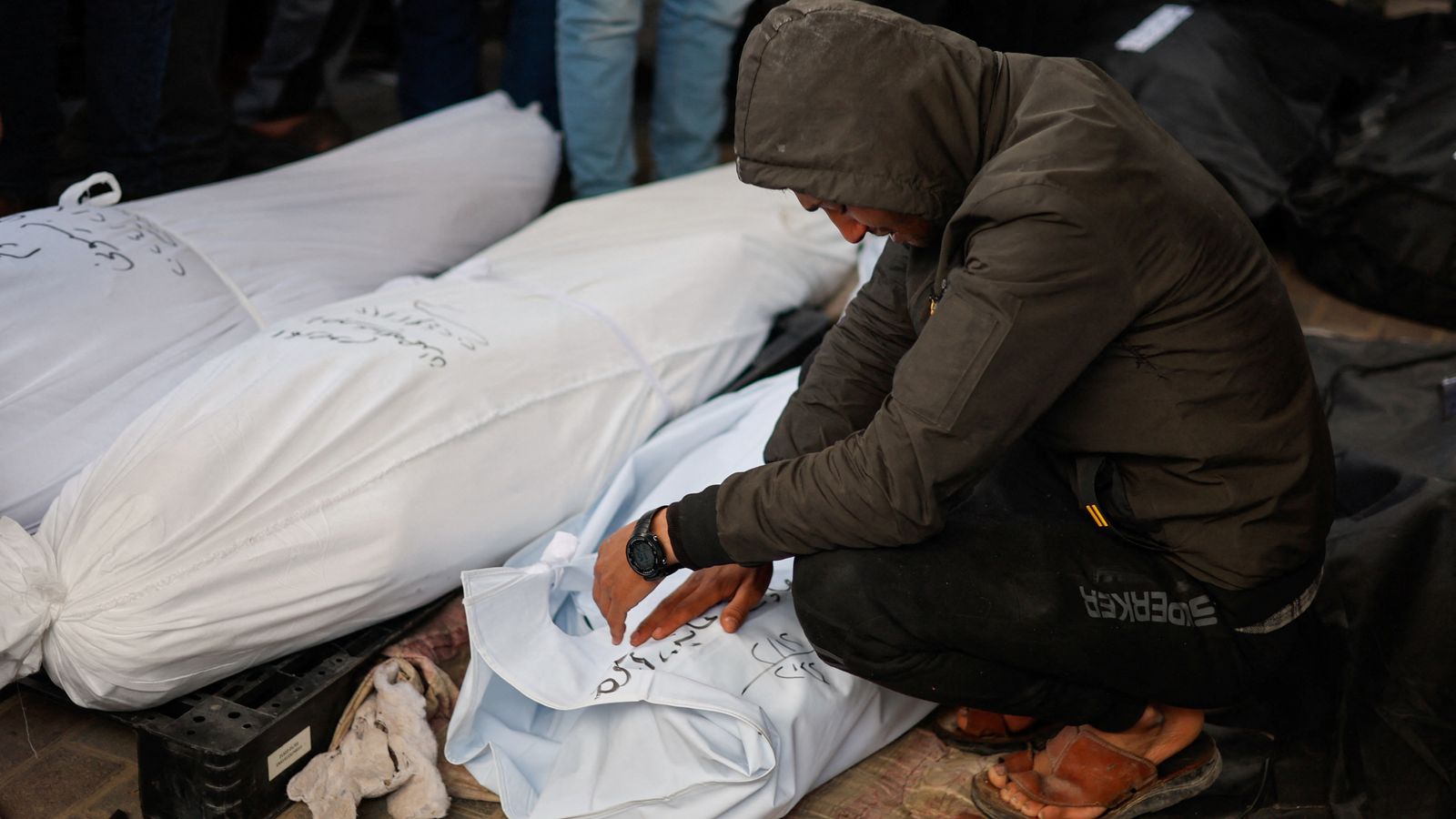 A man reacts next to the bodies of Palestinians killed in Israeli strikes in February. Pic: Reuters