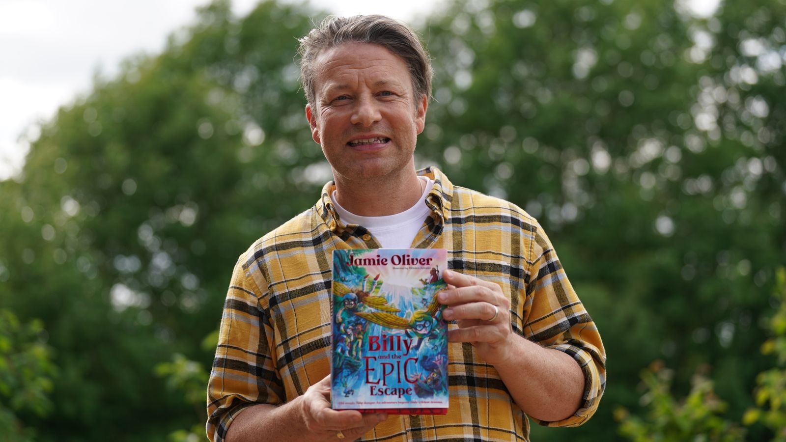 Jamie Oliver during a visit to Great Bradfords Junior School, in Braintree, Essex, as he launches his new book, Billy and the Epic Escape. Picture date: Thursday May 23, 2024.