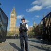 A police officer stands at the Carriage Gates entrance to parliament. File pic: PA