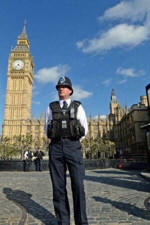 A police officer stands at the Carriage Gates entrance to parliament. File pic: PA