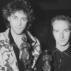 Midge Ure (R), 31, of the rock group Ultravox, with Bob Geldof at the Ivor Novello Awards for 1984 at the Grosvenor House Hotel, London. The pair won a joint award for the Band Aid single 'Do They Know It's Christmas?"