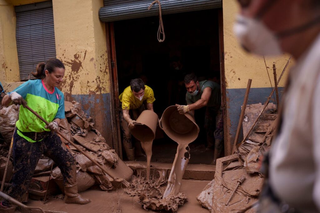 Fresh storms in Spain deluge streets, forcing schools to close and residents to flee homes