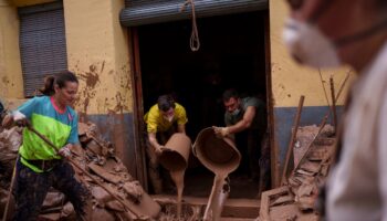 Fresh storms in Spain deluge streets, forcing schools to close and residents to flee homes