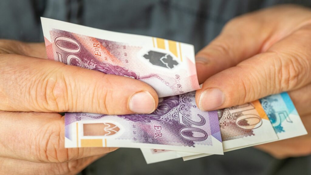 A file picture of someone counting money. Pic: iStock