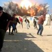 Palestinians flee an Israeli airstrike in northern Gaza