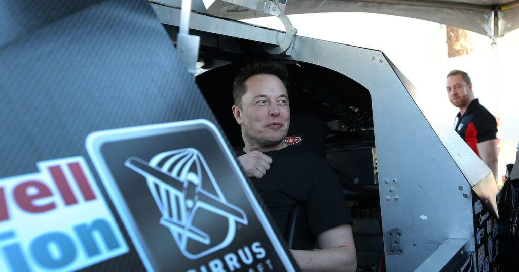 Ellon Musk, founder and CEO of SpaceX sits in a pod displayed in a booth during the SpaceX Hyperloop Pod Competition in Hawthorne, Los Angeles, California, U.S., January 29, 2017. REUTERS/Monica Almeida - RTSY00M