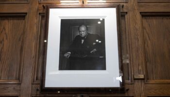 Yousuf Karsh's 1941 portrait of Winston Churchill, which he gifted to the Fairmont Chateau Laurier, is seen after being unveiled at the hotel following its theft and return, Friday, Nov. 15, 2024 in Ottawa, Ontario. (Adrian Wyld/The Canadian Press via AP)