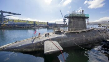 Vanguard-class submarine HMS Vigilant, one of the UK's four nuclear warhead-carrying submarines at HM Naval Base Clyde, Faslane, west of Glasgow, Scotland on April 29, 2019. A tour of the submarine was arranged to mark fifty years of the continuous, at sea nuclear deterrent. (Photo by James Glossop / POOL / AFP)