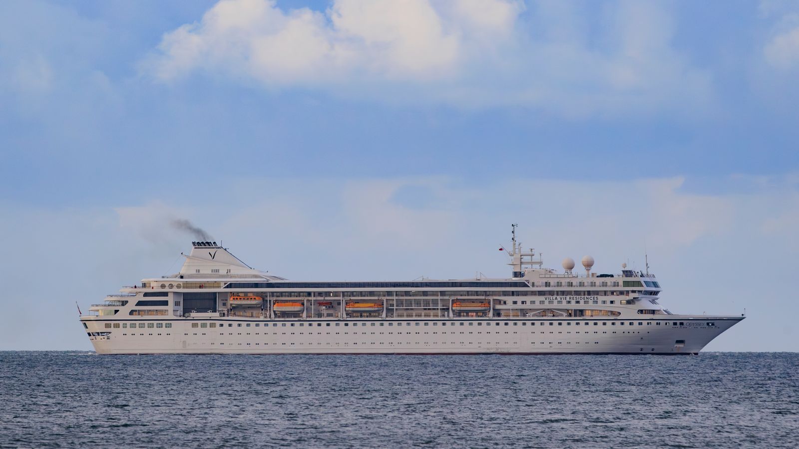 Villa Vie Odyssey cruise ship leaving Belfast Lough after being anchored off the coast on Bangor, Northern Ireland. The luxury cruise ship became marooned in Belfast for four months due to unexpected repair works and has finally got underway. Picture date: Thursday October 03, 2024.