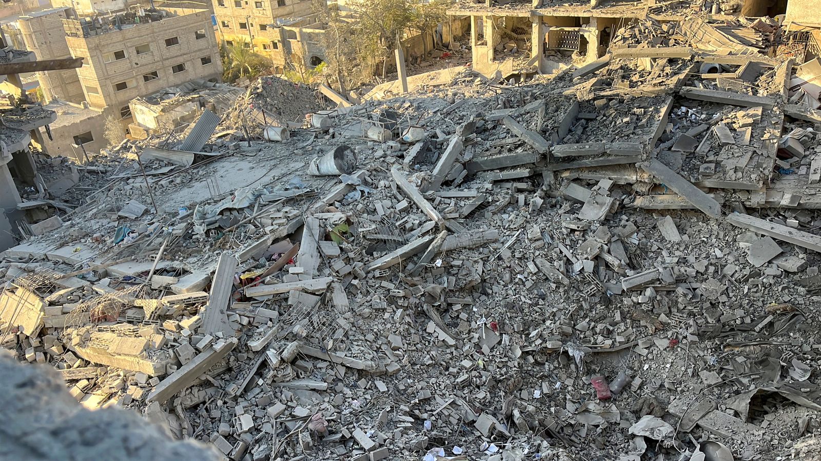 A multi-storey residential building lies in ruins following an Israeli strike in Beit Lahiya in northern Gaza. Pic: Reuters