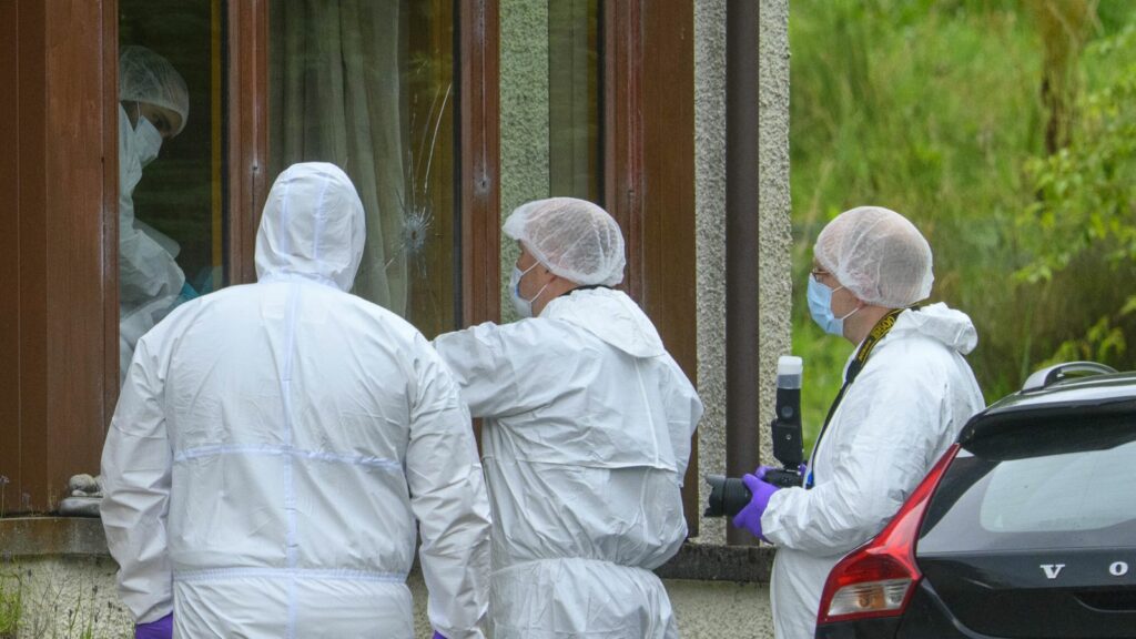 Forensics officers at the scene of an incident at a property in the Dornie area of Wester Ross, on the northwest coast of Scotland. A 47-year-old man has died and three people have been injured in a series of incidents on the Isle of Skye and in nearby Wester Ross, on the mainland of Scotland, where a firearm was discharged. Picture date: Thursday August 11, 2022.