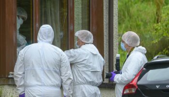 Forensics officers at the scene of an incident at a property in the Dornie area of Wester Ross, on the northwest coast of Scotland. A 47-year-old man has died and three people have been injured in a series of incidents on the Isle of Skye and in nearby Wester Ross, on the mainland of Scotland, where a firearm was discharged. Picture date: Thursday August 11, 2022.