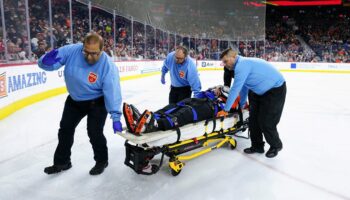 NHL ref leaves game on stretcher after colliding with Avalanche player