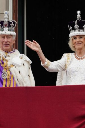 King Charles III and Queen Camilla on the balcony of Buckingham Palace, London, following the coronation. Picture date: Saturday May 6, 2023.