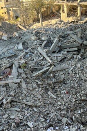 A multi-storey residential building lies in ruins following an Israeli strike in Beit Lahiya in northern Gaza. Pic: Reuters