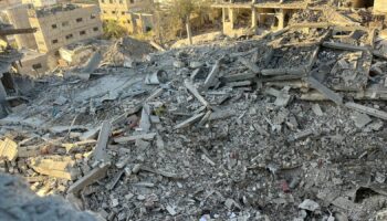 A multi-storey residential building lies in ruins following an Israeli strike in Beit Lahiya in northern Gaza. Pic: Reuters