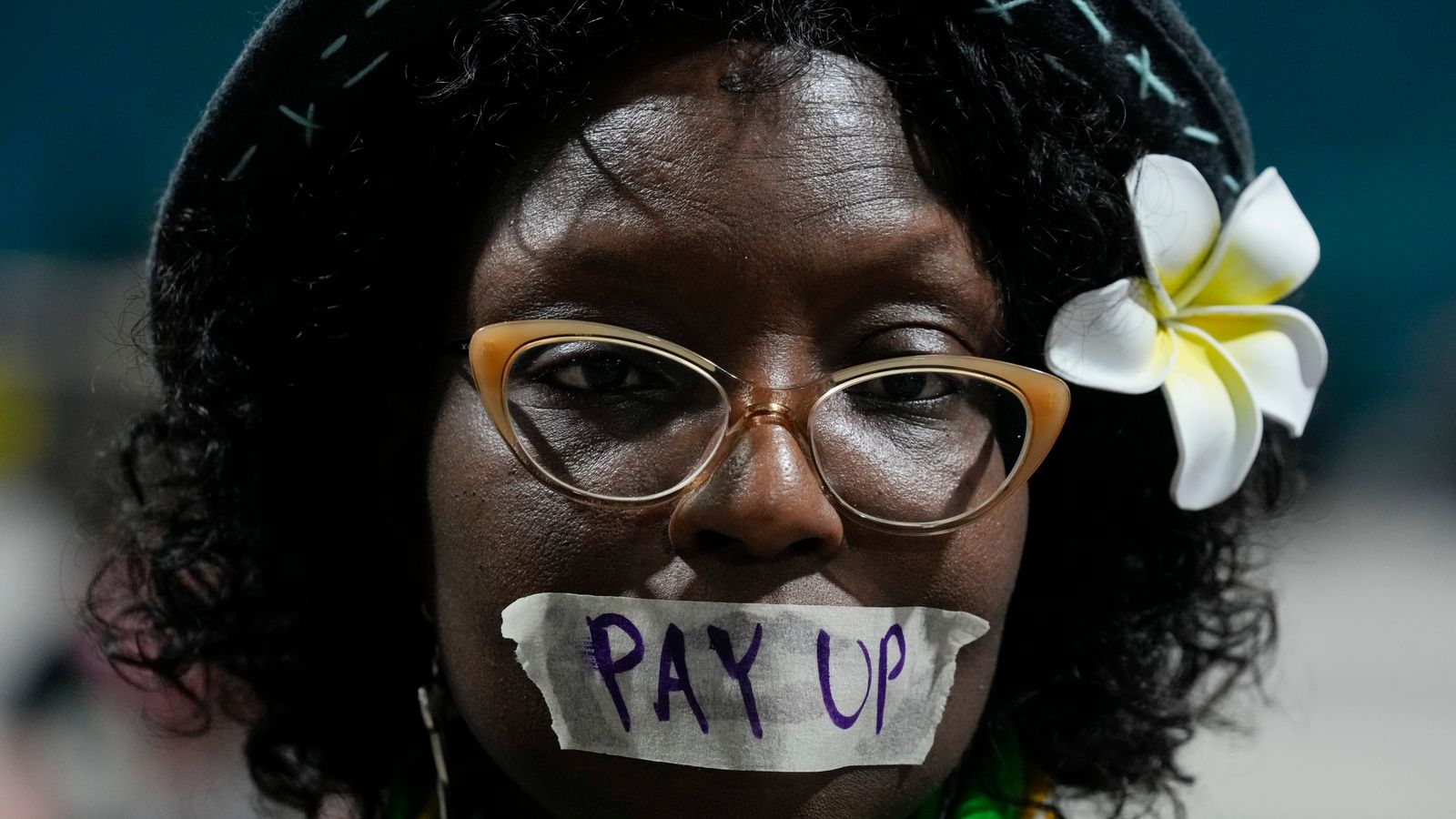 An activist during a demonstration for climate finance at the COP29. Pic: AP