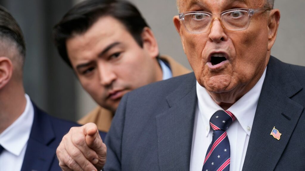 Rudy Giuliani speaks to reporters as he leaves the federal courthouse in New York, Tuesday, Nov. 26, 2024. (AP Photo/Seth Wenig)