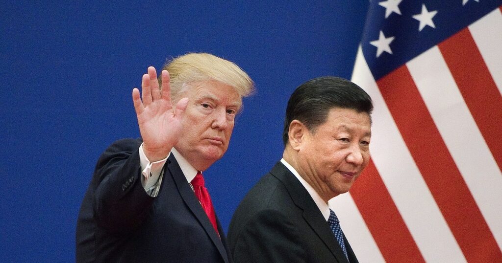 Les présidents des Etats-Unis Donald Trump (g) et de la Chine Xi Jinping, le 9 novembre 2017 à Pékin