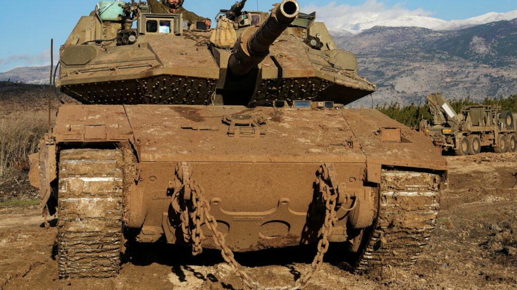 An Israeli tank near Israel's border with Lebanon. Pic: Reuters