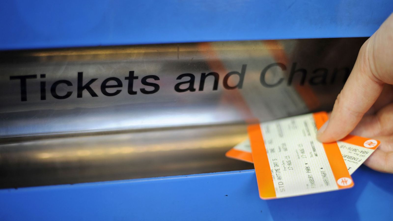 Undated file photo of a person buying a train ticket. Picture by  Lauren Hurley/PA Wire/PA Images