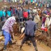 People search for bodies after the landslides in Bulambuli. Pic: Reuters