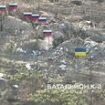 Brave T-shirt-wearing Ukrainian soldier fights off SIX Russians single-handedly in video showing frontline trench warfare