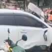 Car driven into crowd outside China primary school