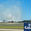 Engine failure forces Qantas flight into ‘distressing’ emergency landing at Sydney airport, sparking grass fire