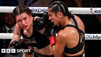 Katie Taylor punches Amanda Serrano during their fight