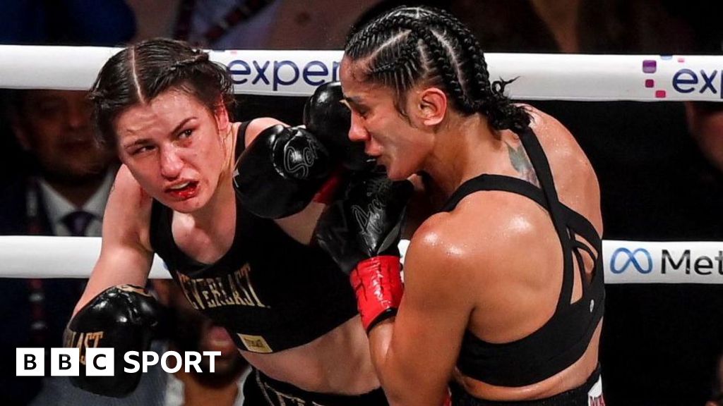 Katie Taylor punches Amanda Serrano during their fight