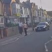 Horror moment driver smashes into pedestrian and hurls him 20ft over garden wall before brawl