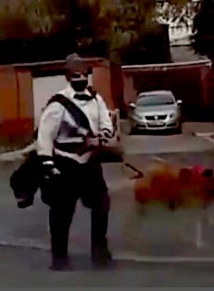 Masked gunman sparks mass shooting fears after he's seen walking towards school